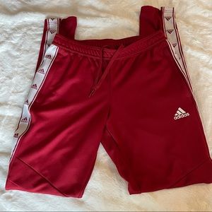 Red adidas track pants!